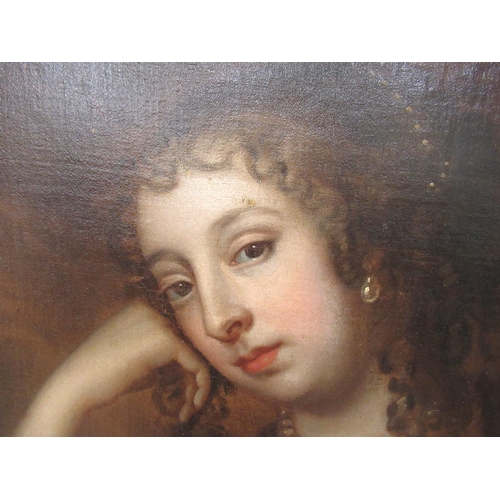 82 - In the manner of Peter Lely - a three-quarter length portrait, a woman wearing a gold coloured dress... 