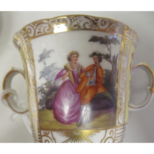 89 - A 19thC Augustus Rex style gilded porcelain twin handled chocolate cup and saucer, decorated with al... 