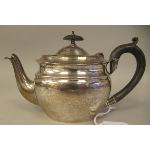 97 - A late Victorian silver batchelors three piece tea set of oval ogee form, comprising a teapot with a... 