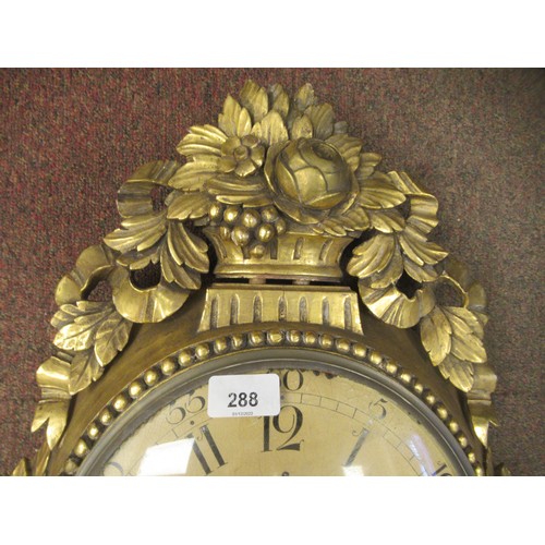 288 - A 19thC style wall clock in an ornate gilt case, decorated with ribbons, flora and garlands; the bel... 