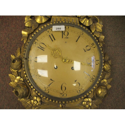 288 - A 19thC style wall clock in an ornate gilt case, decorated with ribbons, flora and garlands; the bel... 