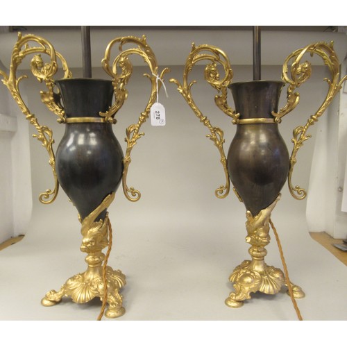 278 - A 20thC pair of Bradley & Hunt bronze finished and gilt metal pedestal table lamps of ovoid form... 