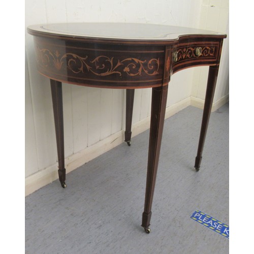 246 - A late 19th/early 20thC Maple & Co mahogany and satinwood marquetry writing table, the top with ... 