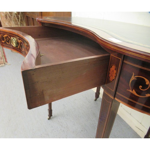 246 - A late 19th/early 20thC Maple & Co mahogany and satinwood marquetry writing table, the top with ... 