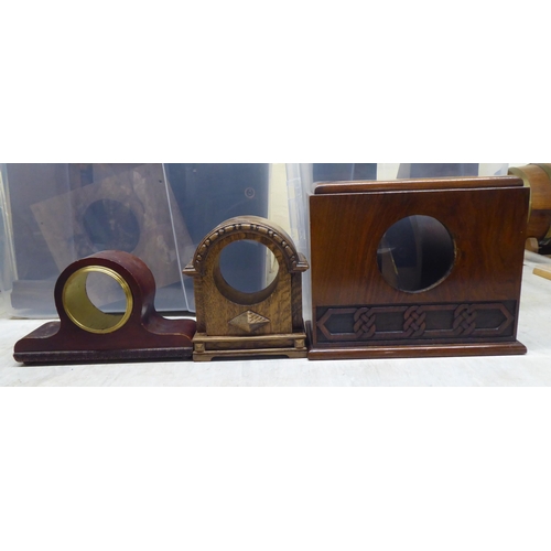 16 - Miscellaneous 19th and 20thC mantel clock cases: to include one, decoratively cast and gilded spelte... 