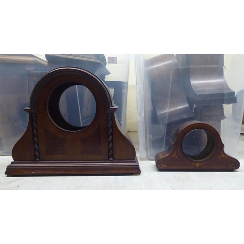 16 - Miscellaneous 19th and 20thC mantel clock cases: to include one, decoratively cast and gilded spelte... 