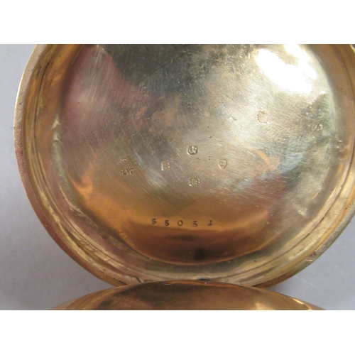 20 - An 18ct gold cased pocket watch with bright-cut floral, scrolled and foliate ornament, faced by a wh... 
