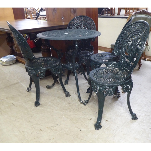 24 - A modern Victorian style green painted cast metal terrace table&nbsp; 28