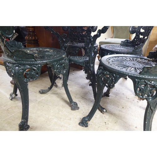 24 - A modern Victorian style green painted cast metal terrace table&nbsp; 28