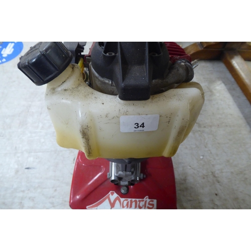 34 - A Mantis Scarifyer with a Honda GX25 petrol engine&nbsp;