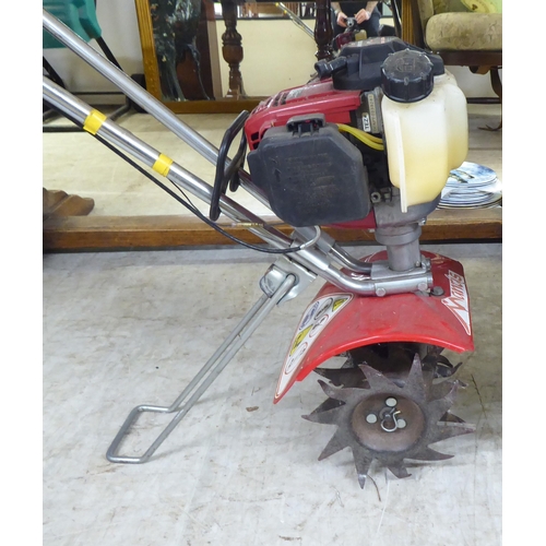 34 - A Mantis Scarifyer with a Honda GX25 petrol engine&nbsp;
