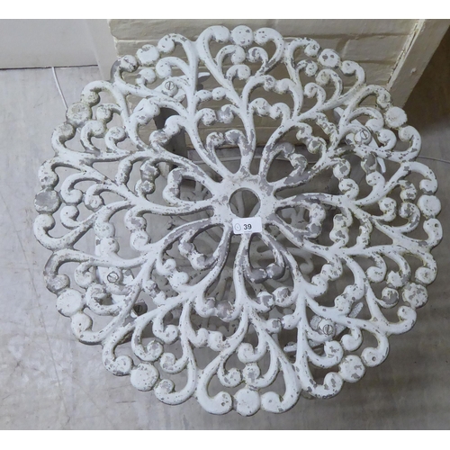 39 - A modern Victorian style white painted cast metal terrace table, raised on sabre legs  17