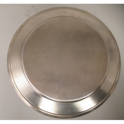 41 - An Annigoni silver plate (no.1120) scratch engraved with a head and shoulders profile portrait of th... 