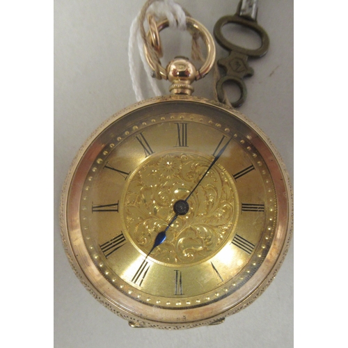 45 - A 14ct gold cased fob watch with bright-cut engraved floral, scrolled and other ornament, faced by a... 
