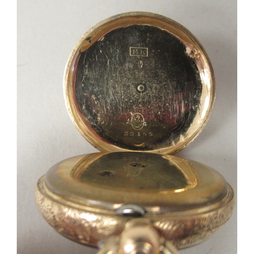45 - A 14ct gold cased fob watch with bright-cut engraved floral, scrolled and other ornament, faced by a... 
