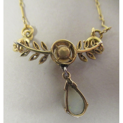 51 - A Victorian gold coloured metal, diamond, pearl and opal set necklet, on a fine elongated and ring l... 