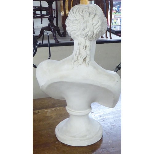 53 - A white painted plaster bust, featuring a classical maiden, on a socle&nbsp; 20