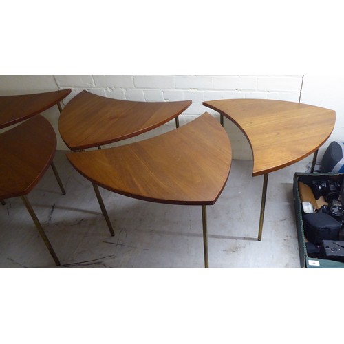12 - A set of six 1960s Peter Hvidt & Olga Molgaard, pinwheel teak occasional tables, each raised on ... 