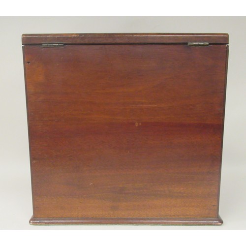 160 - An early 20thC walnut veneered desktop stationary box, the cushion moulded, hinged top revealing a r... 