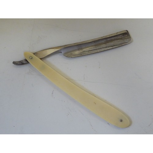 83 - An early 20thC set of seven Joseph Rodgers & Sons of Sheffield barber's cutthroat razors, each b... 