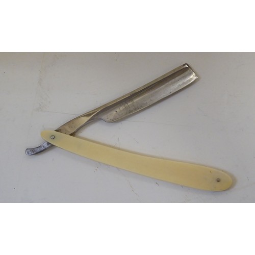 83 - An early 20thC set of seven Joseph Rodgers & Sons of Sheffield barber's cutthroat razors, each b... 