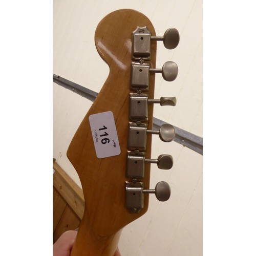 67 - A six string electric guitar