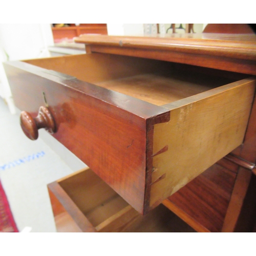 10 - A late Victorian mahogany bow front sideboard, the central, recessed cupboard, flanked by an arrange... 