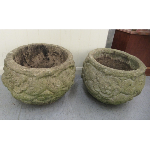 100 - A pair of composition stone planters of fish bowl form, decorated in relief with flora  13