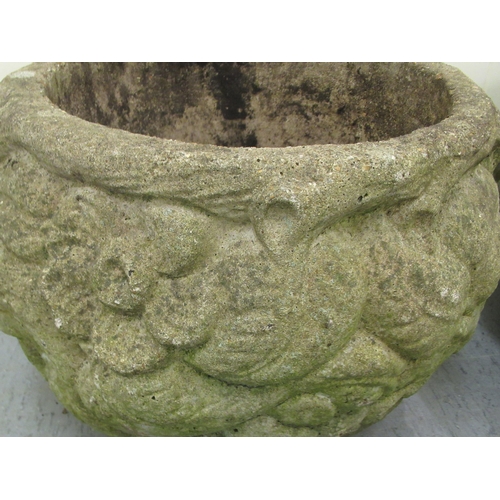 100 - A pair of composition stone planters of fish bowl form, decorated in relief with flora  13