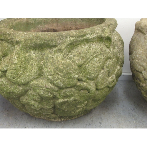 102 - A pair of composition stone planters of fish bowl form, decorated in relief with flora  13