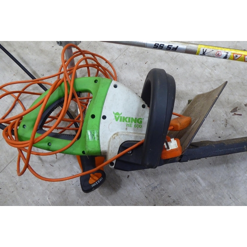 108 - A Viking HE600 electrically powered  hedge trimmer; and a petrol driven strimmer