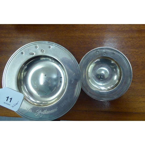 11 - Silver and white metal items, viz. two Armada design dishes  3.25