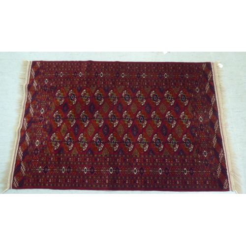 116 - A Turkoman rug  39