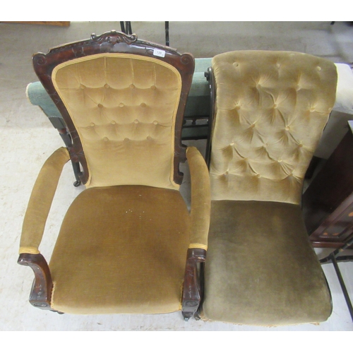 128 - Two similar late Victorian ebonised framed salon chairs, upholstered in a gold coloured fabric, rais... 