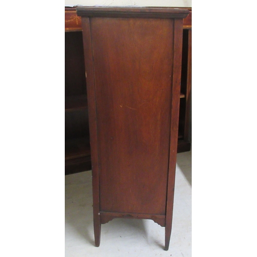 131 - A late Victorian walnut music cabinet with a mirrored and glazed door, raised on square legs  3... 