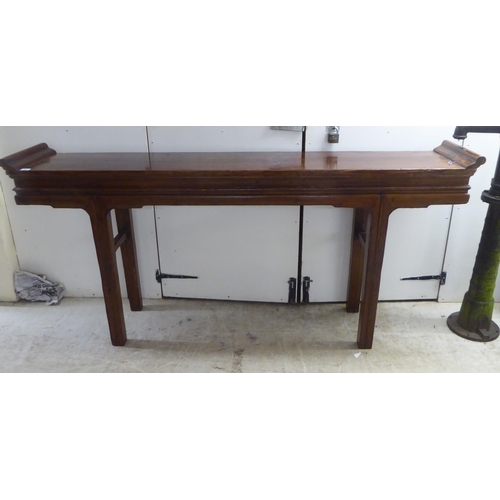 148 - A modern Chinese design, hardwood alter table, raised on tapered legs  36