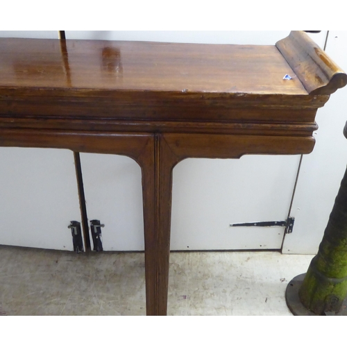 148 - A modern Chinese design, hardwood alter table, raised on tapered legs  36