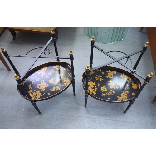 152 - A pair of antique inspired black painted metal and gilded twin tray top occasional tables, raised on... 