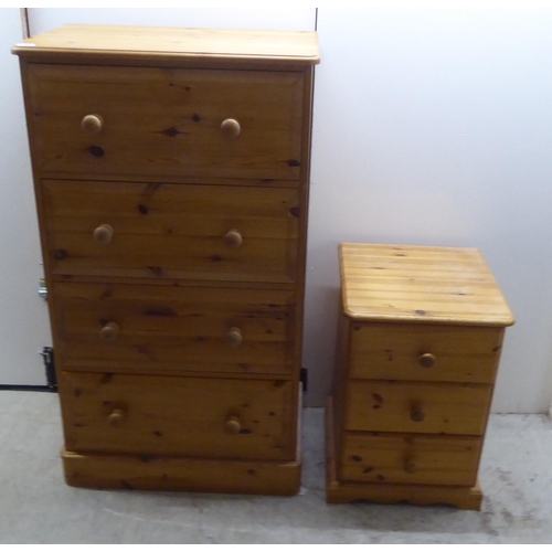 168 - A modern pine four drawer dressing chest, on a plinth  48