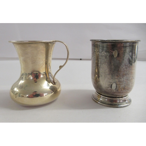 175 - A silver beaker; and a silver cream jug  mixed marks