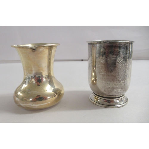 175 - A silver beaker; and a silver cream jug  mixed marks