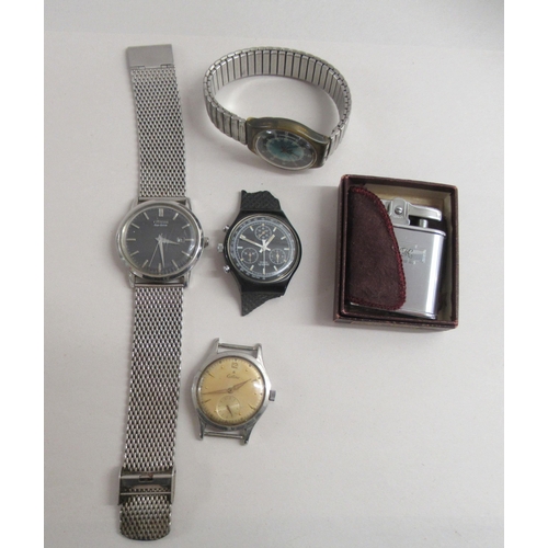 176 - A Ronson stainless steel cigarette lighter  boxed; and four various gentlemen's wristwatches: to inc... 