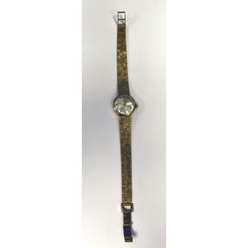 178 - A lady's Girard Perregaux 9ct gold cased and strapped wristwatch, faced by a baton dial