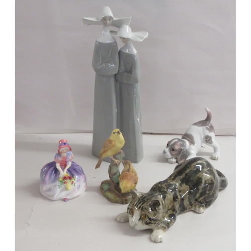 200 - Ceramic figures and animals: to include a Lladro playful puppy  5