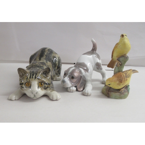 200 - Ceramic figures and animals: to include a Lladro playful puppy  5