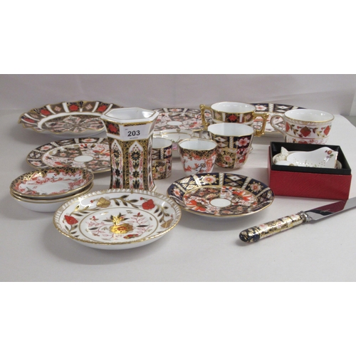 203 - Royal Crown Derby porcelain collectables: to include an Imari pattern coffee cup and saucer