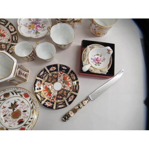 203 - Royal Crown Derby porcelain collectables: to include an Imari pattern coffee cup and saucer