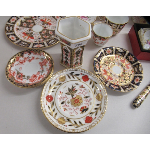 203 - Royal Crown Derby porcelain collectables: to include an Imari pattern coffee cup and saucer