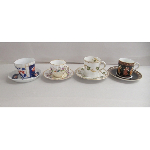 204 - Cabinet cups and saucers: to include a pair of Edwardian Aynsley coffee cans and saucers with silver... 