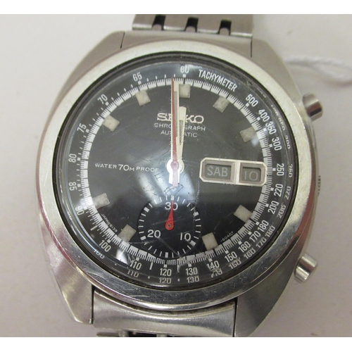 211 - A 1970s Seiko automatic chronograph stainless steel cased and strapped wristwatch, faced by a baton ... 